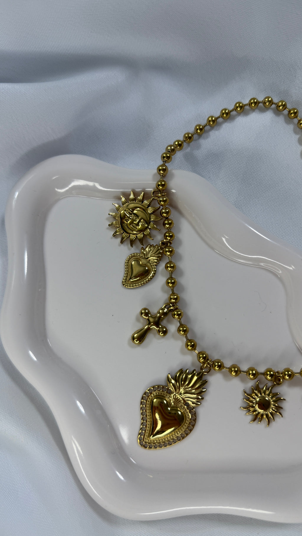 Collana gold multicharm cuore sacro