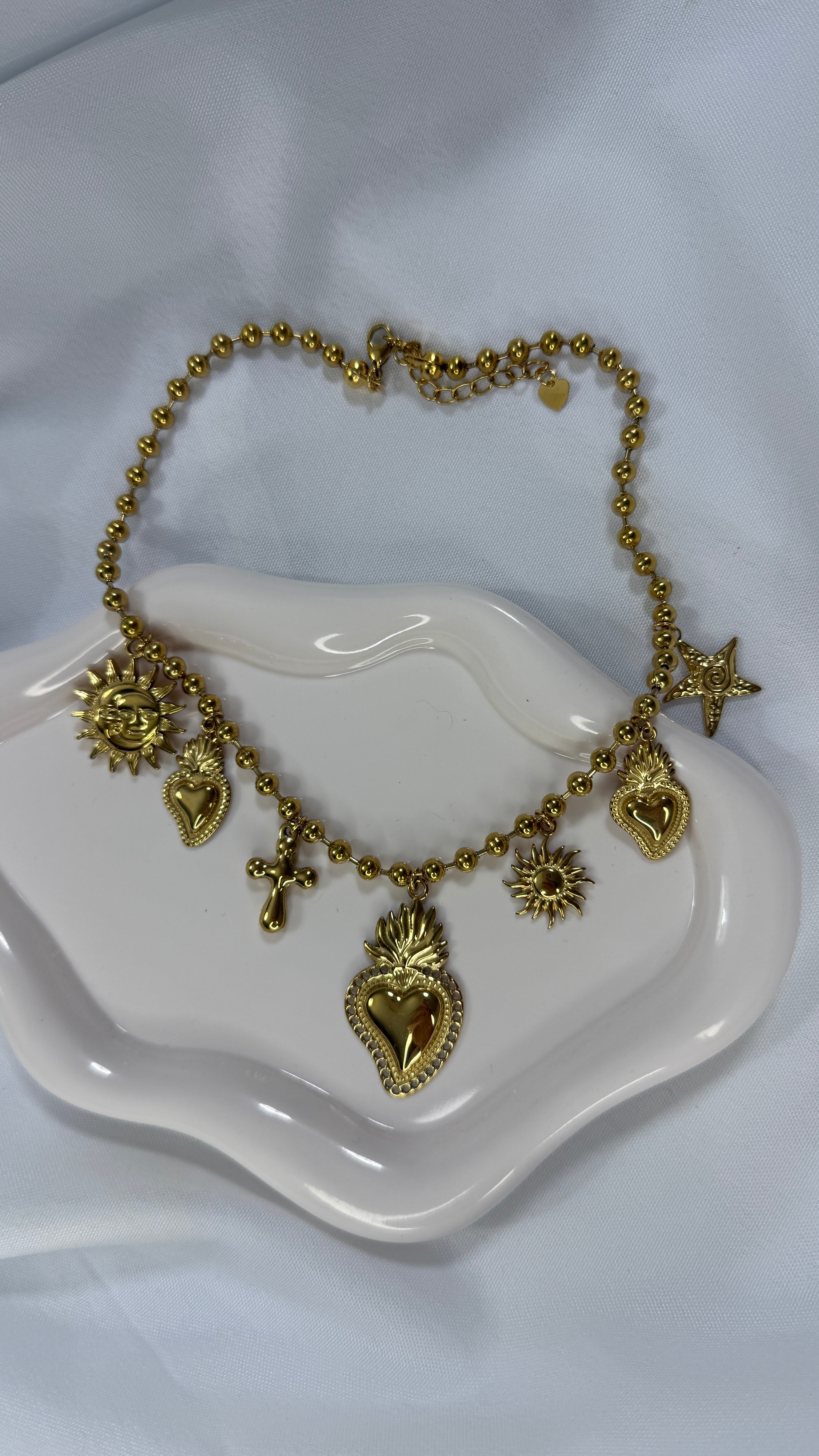 Collana gold multicharm cuore sacro