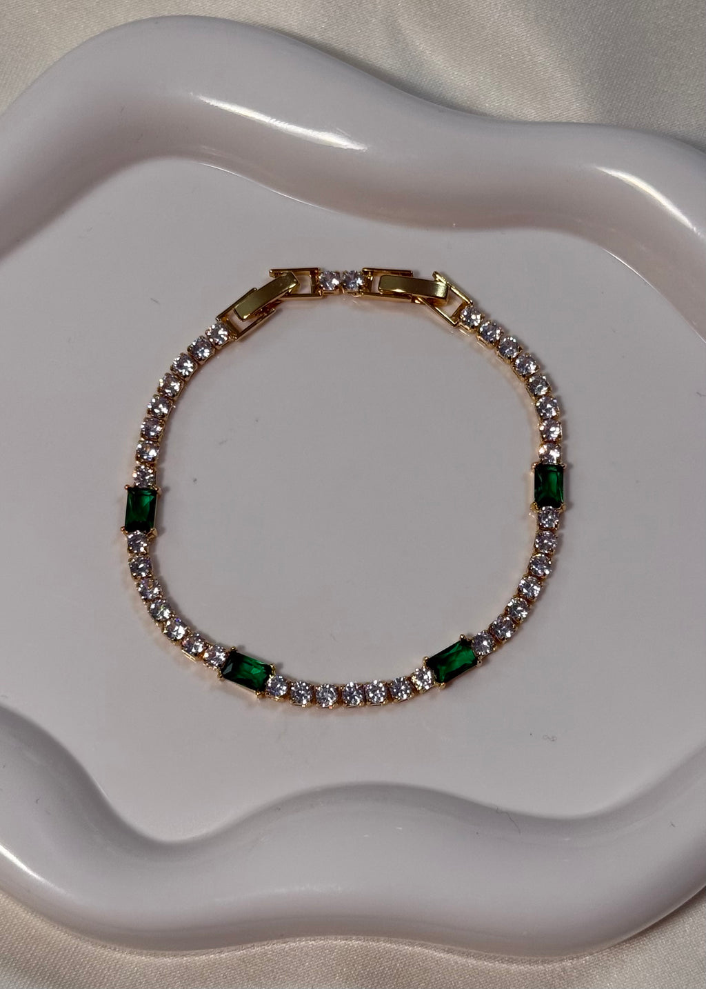 Tennis gold con pietra verde