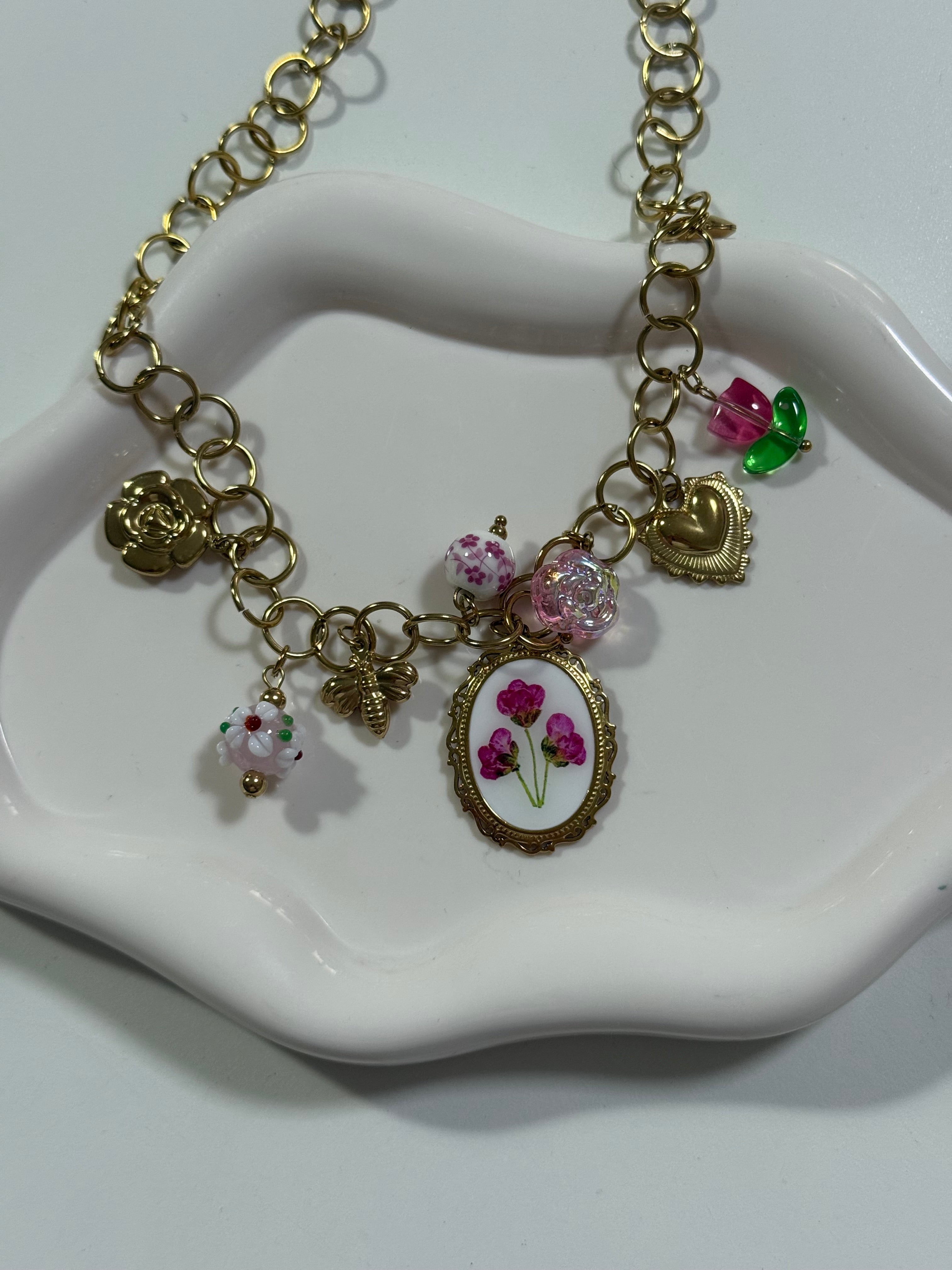 Collana multicharm