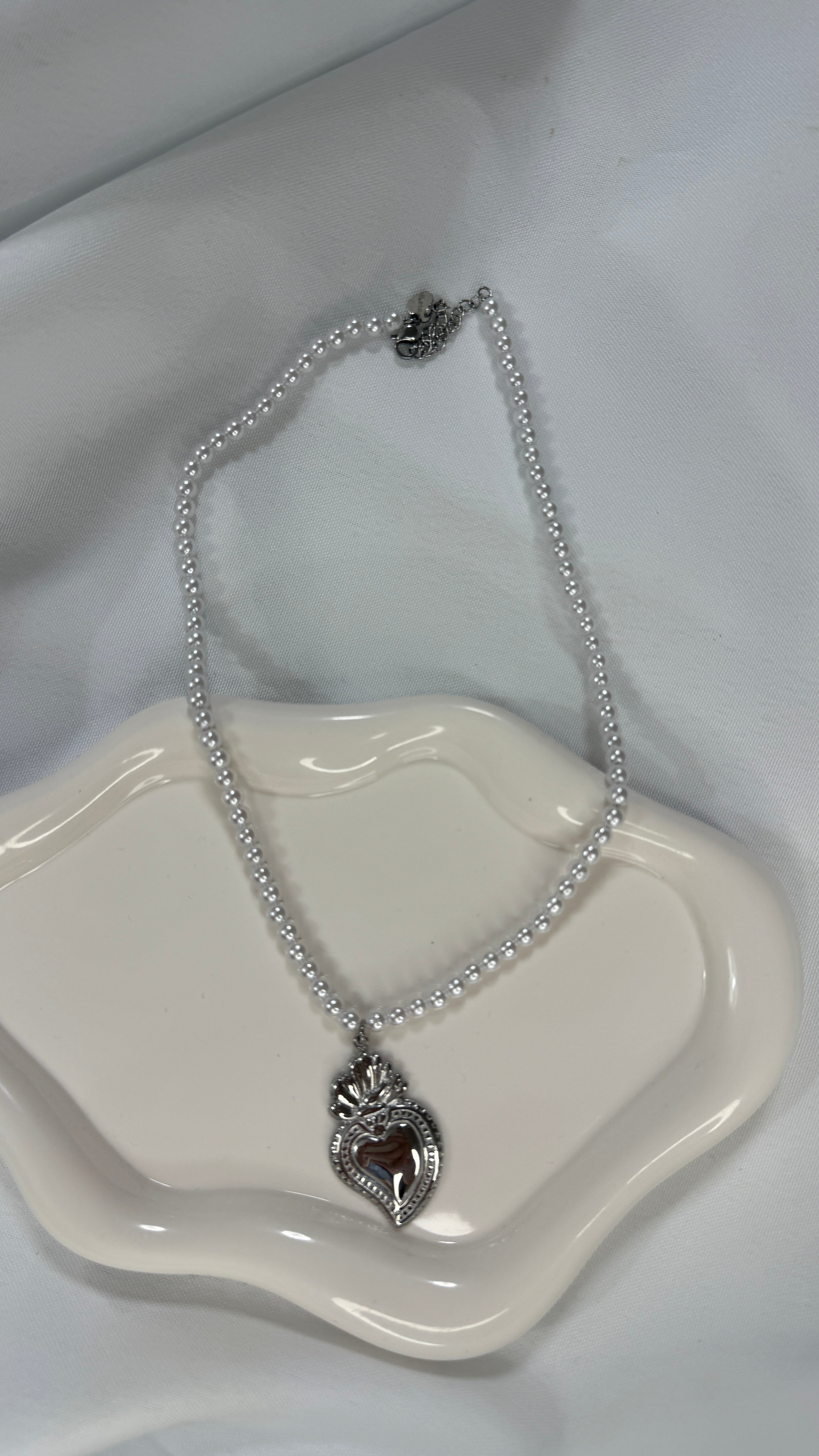 Collana perline e cuore sacro