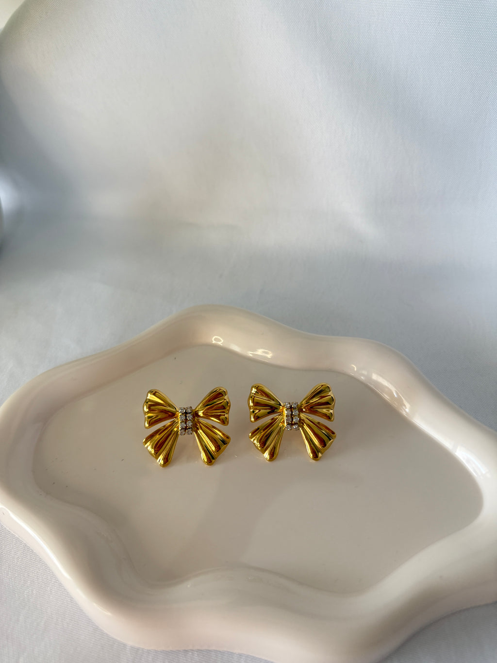 Orecchini fiocco gold