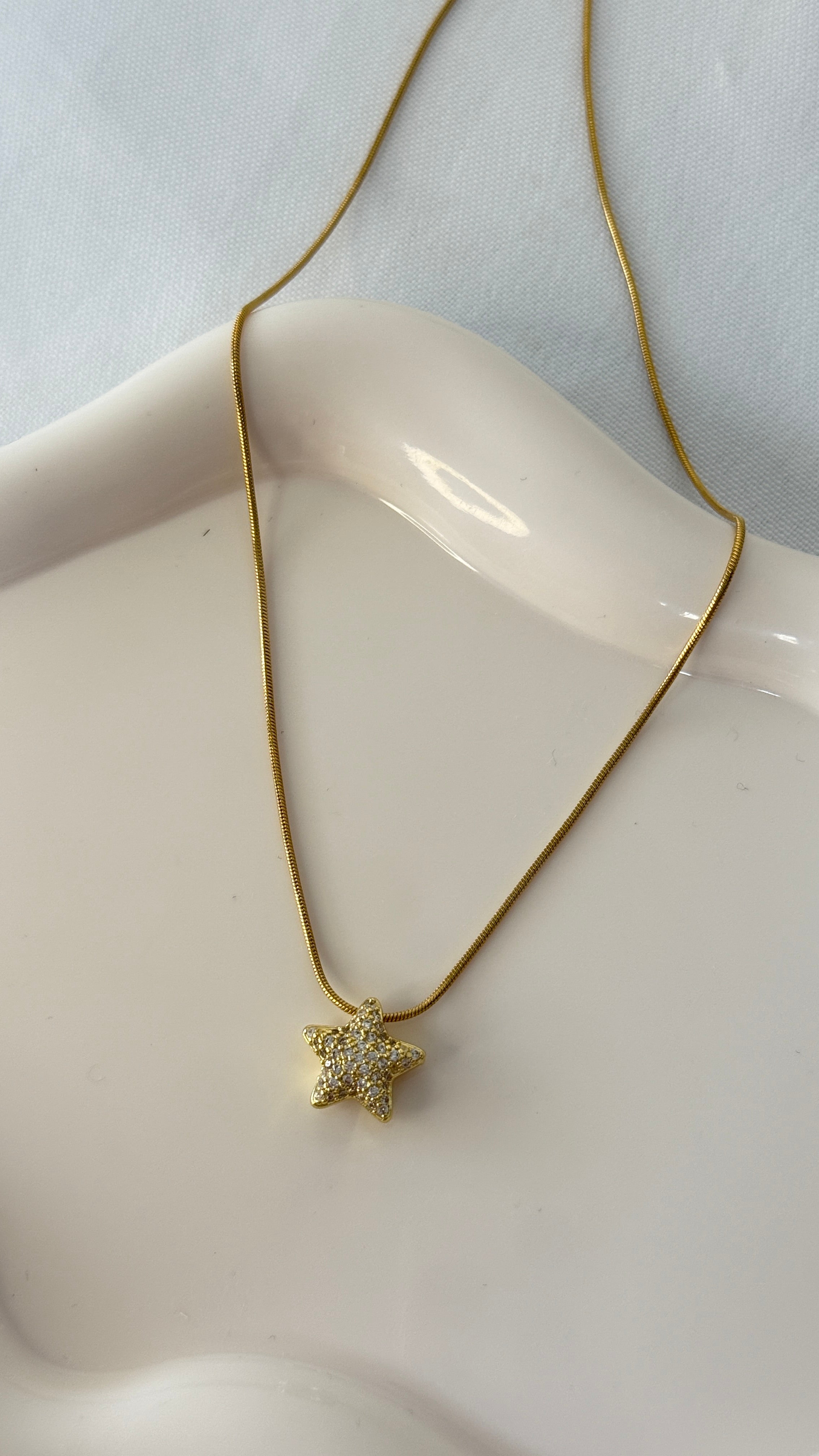 Collana con stellina brillantinata