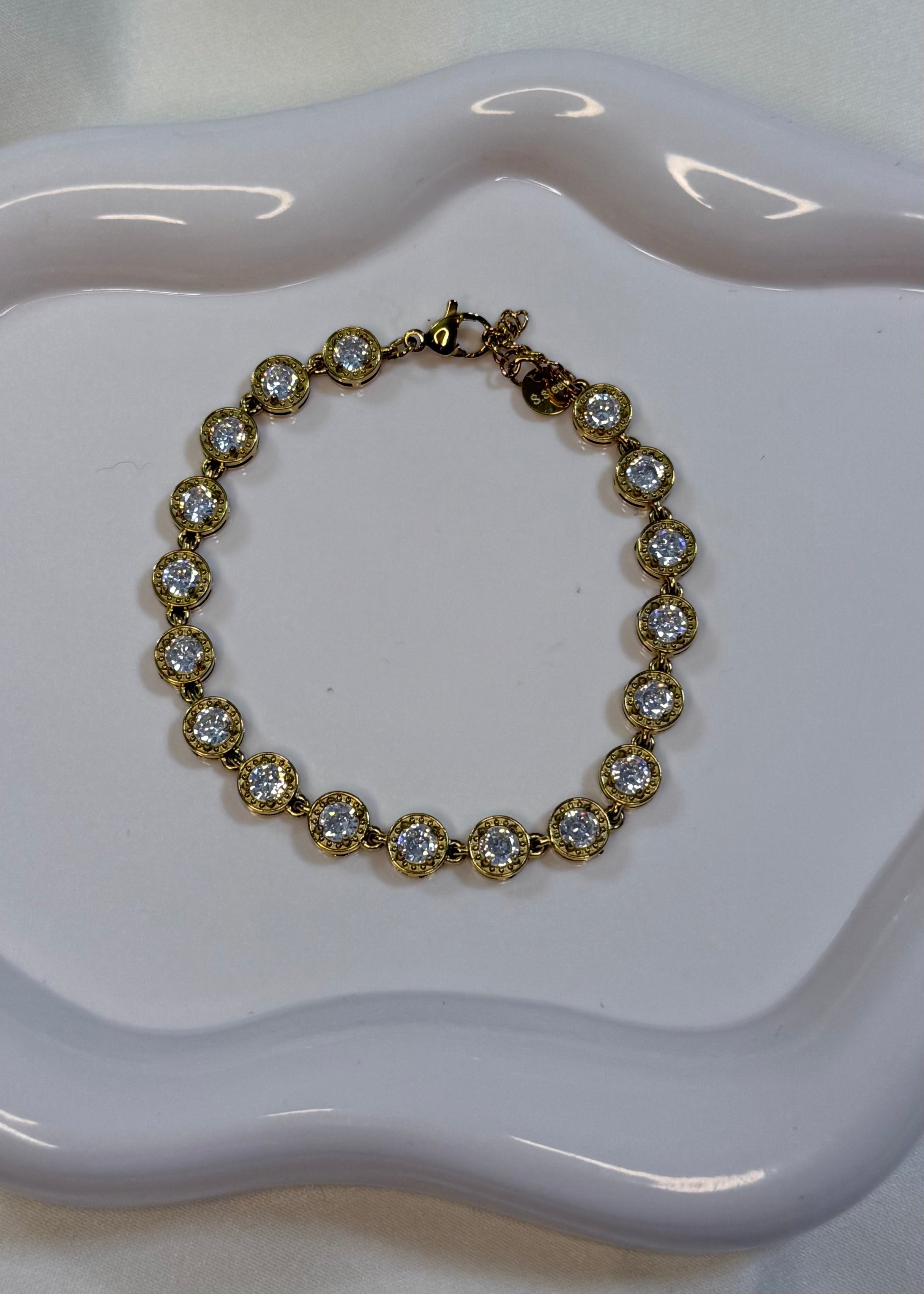 Tennis gold con pietra bianca tonda