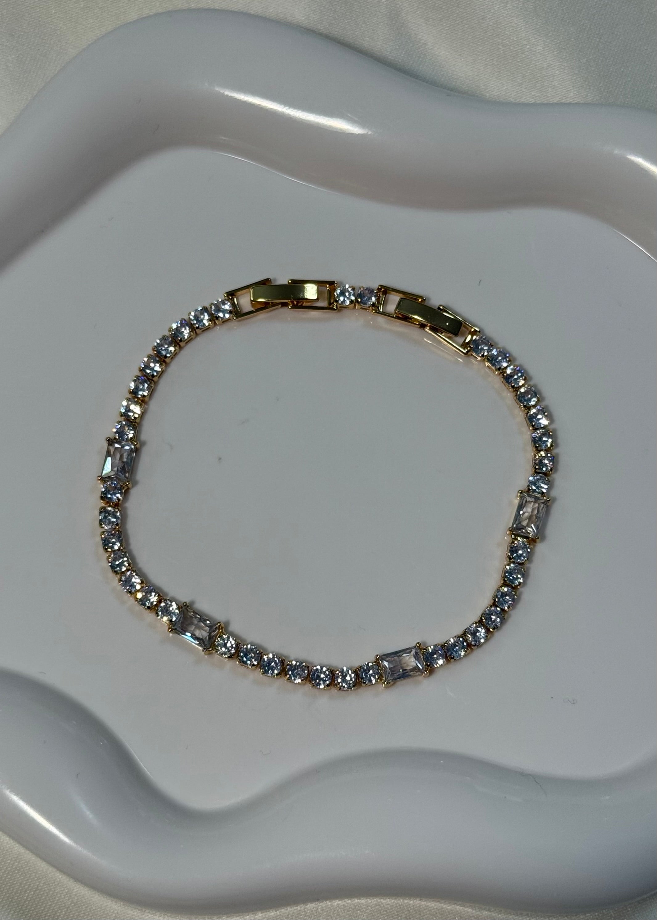 Tennis gold con pietra bianca