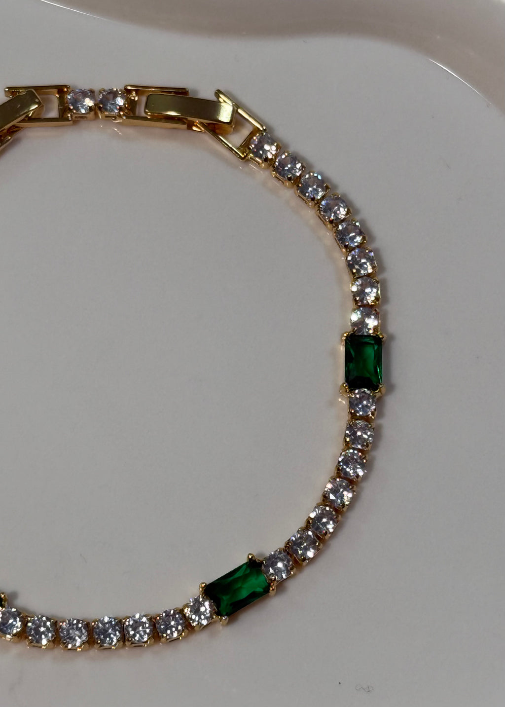 Tennis gold con pietra verde