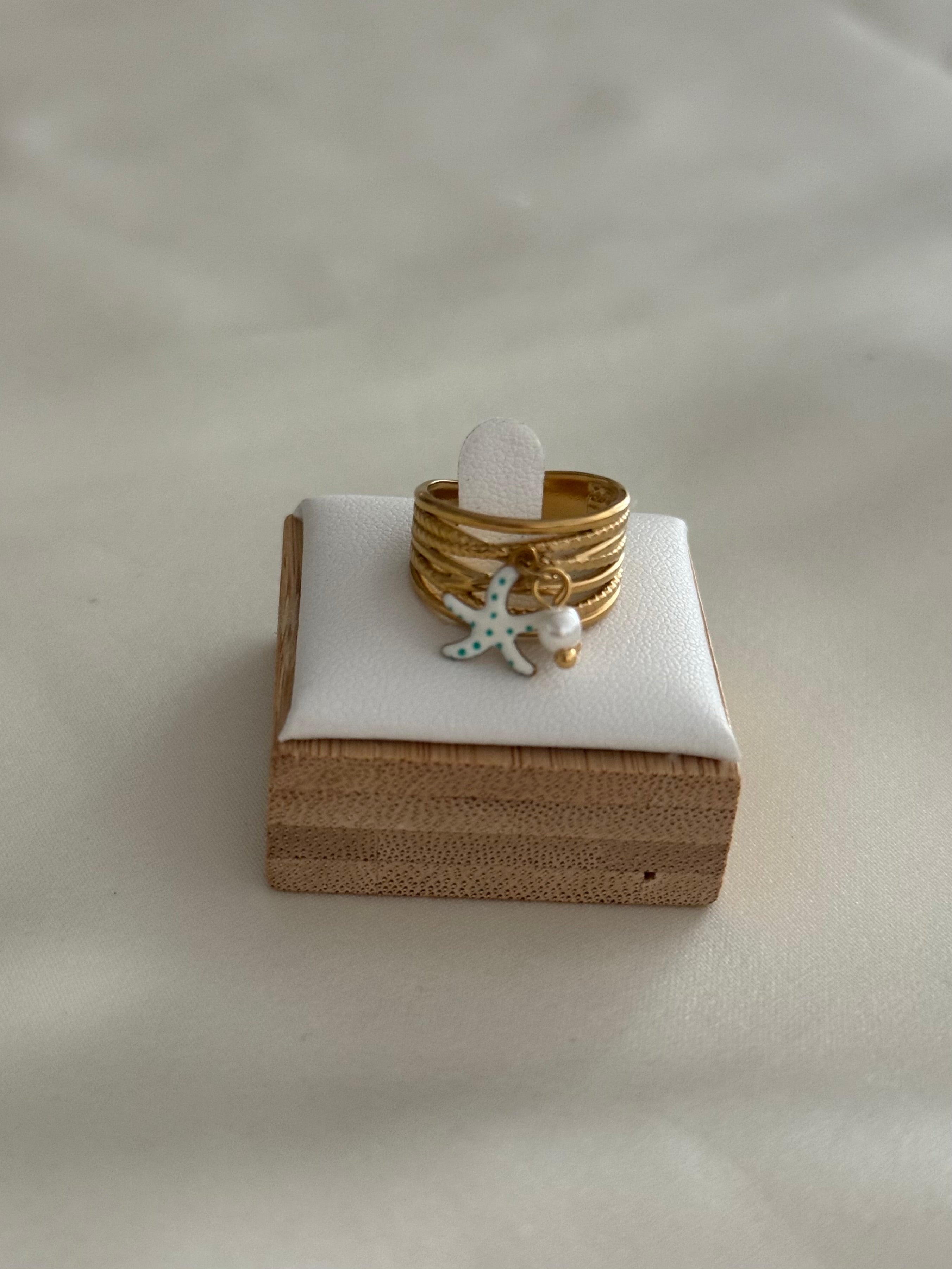 Anello stellina pendente