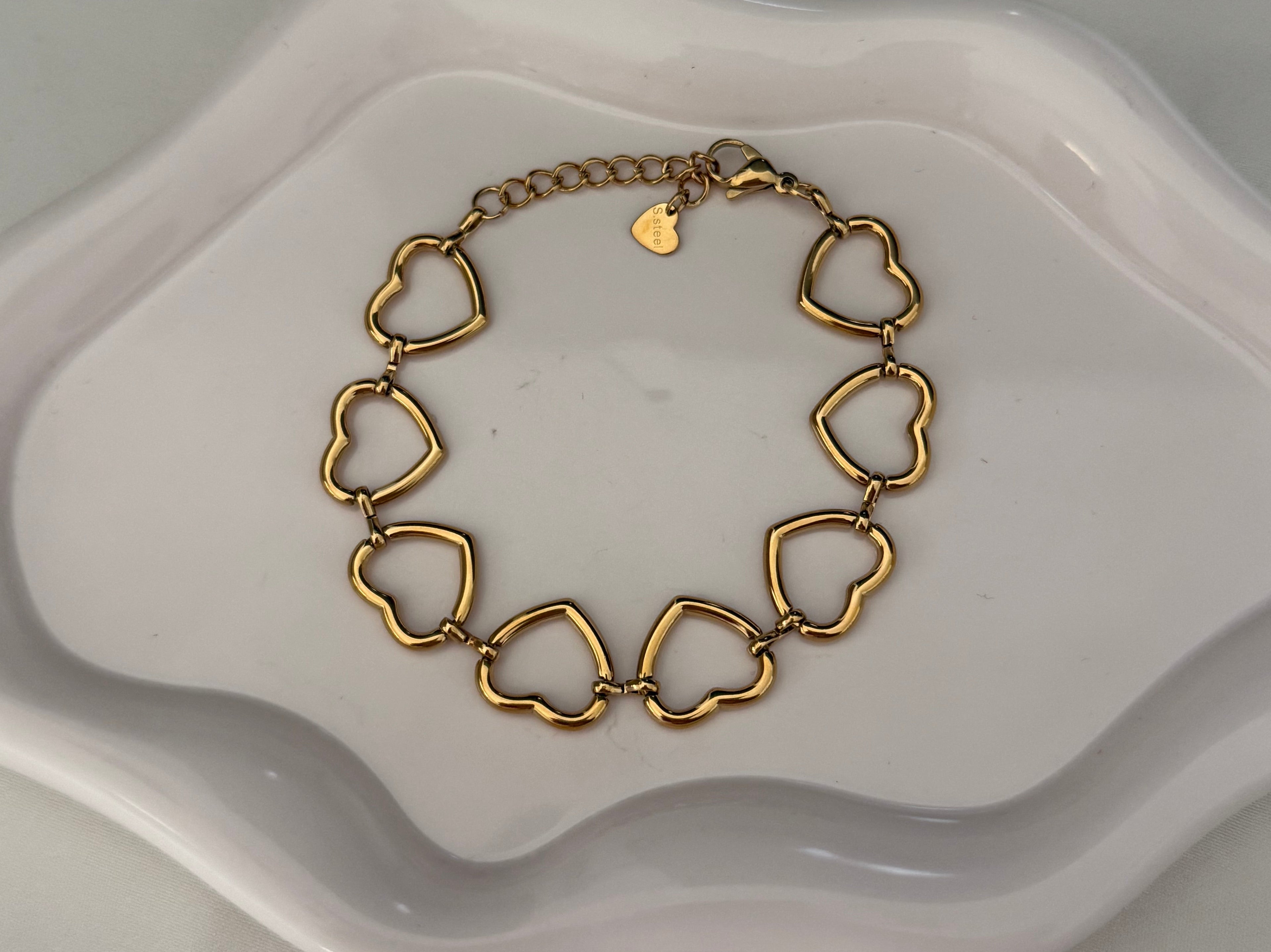Bracciale “catena di cuori” gold
