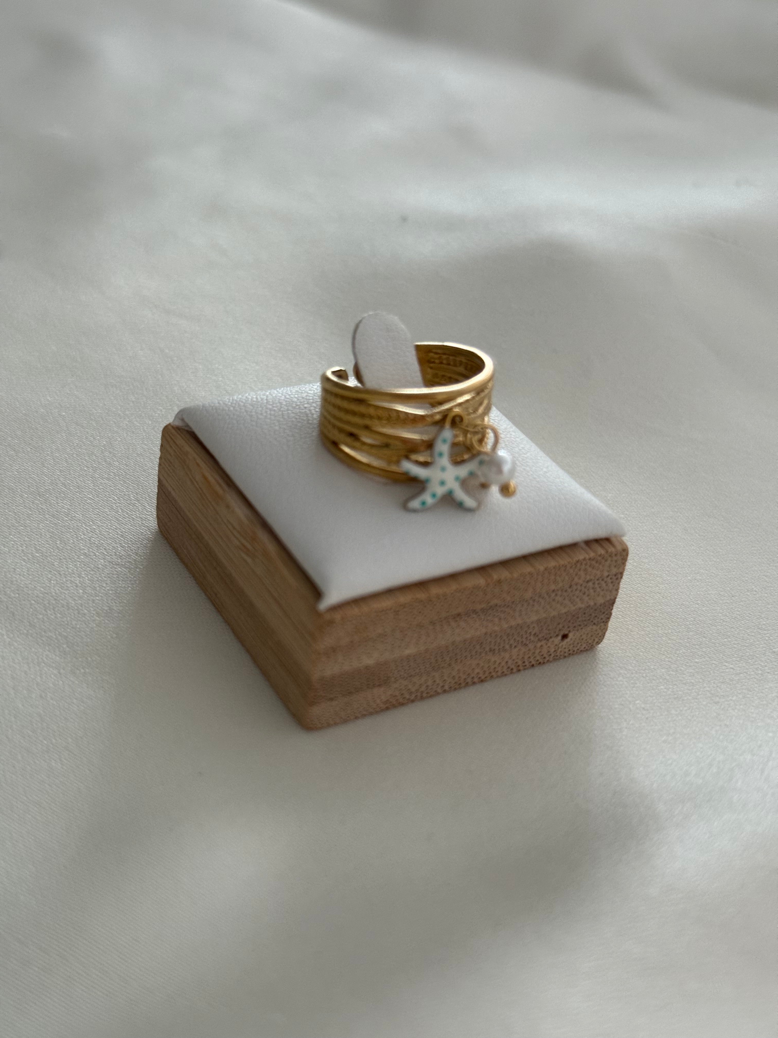 Anello stellina pendente