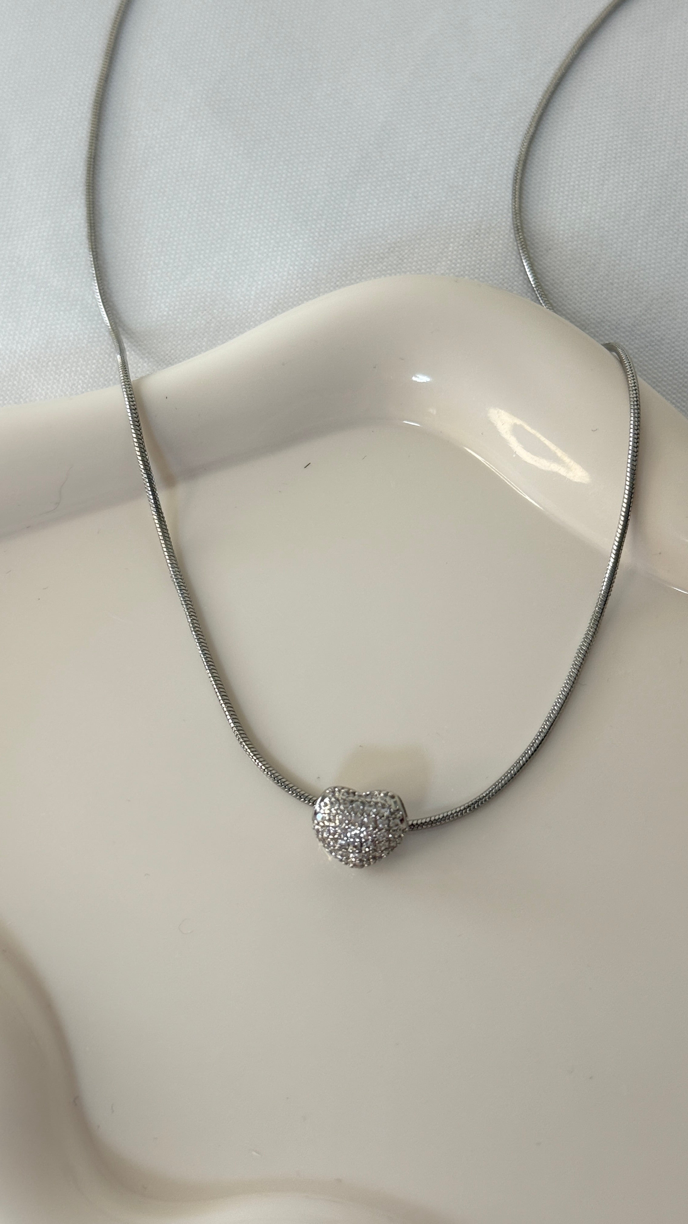 Collana con cuore bombato brillantinato